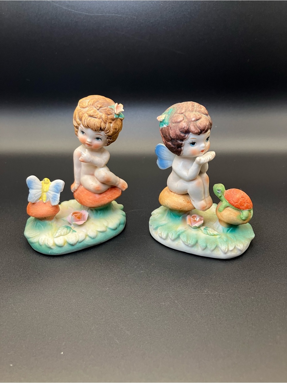 Pair of Porcelain Cherub / Fairy Kitschy Figurines with Butterfly & Turtle